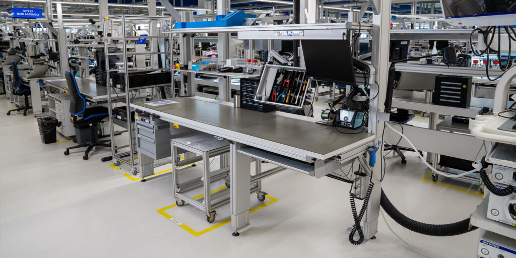 ergonomic work bench design at Olympus